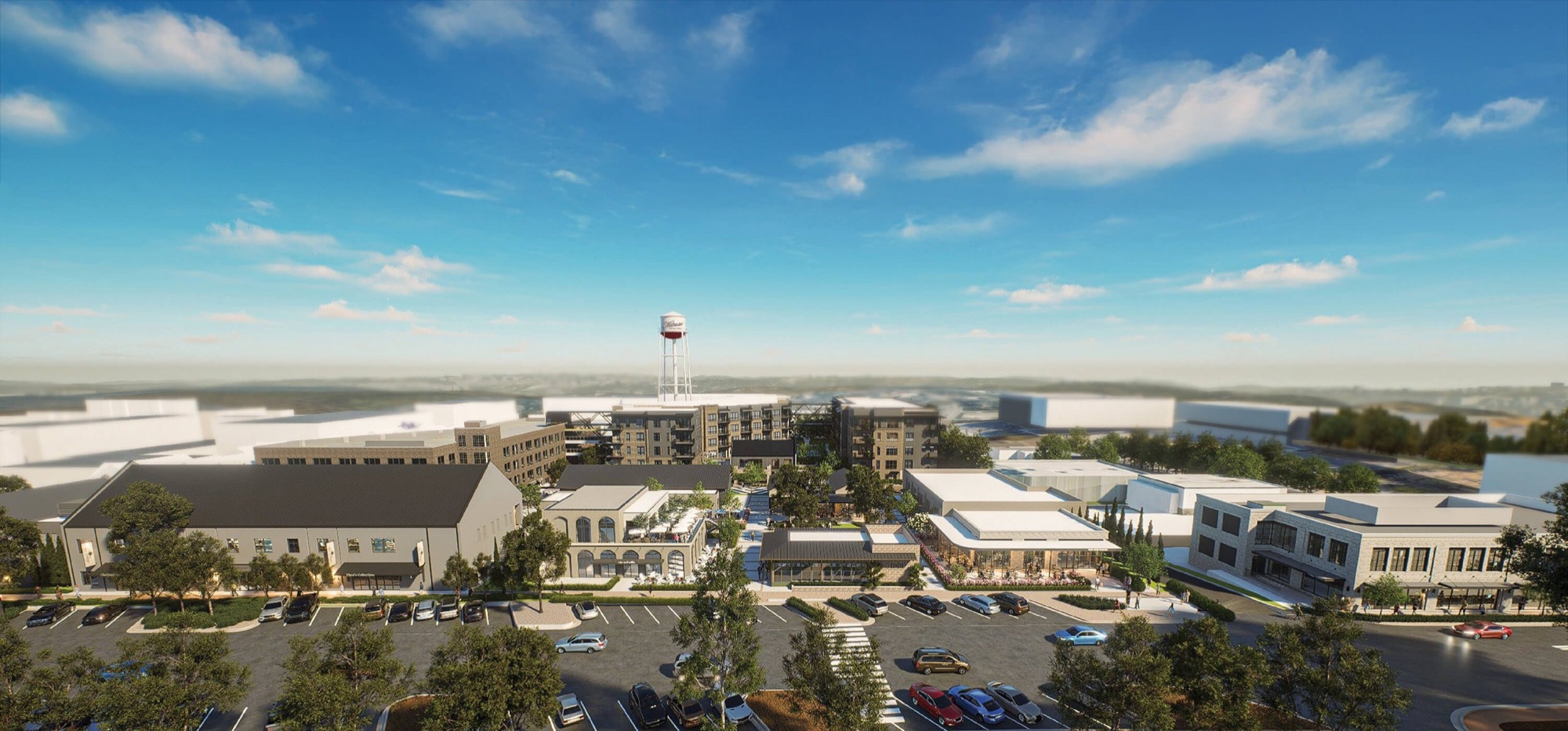 Aerial rendering of Hillrose Market in Roswell: a mixed-use block of apartments, townhomes and ground-floor retail beside City Hall.
